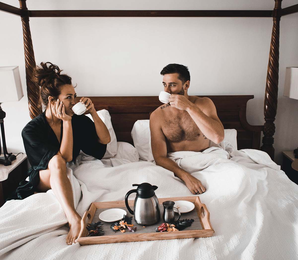  man drinking some coffee beside woman 