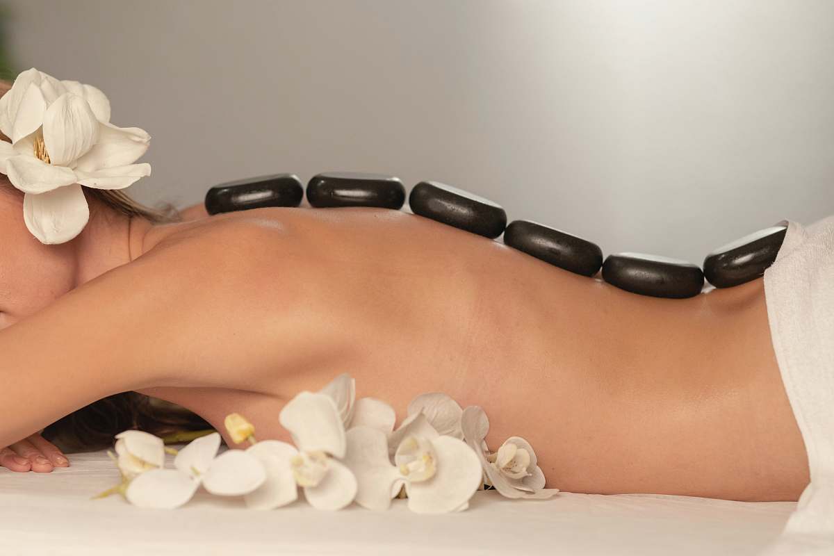 human white and brown ceramic figurine massage