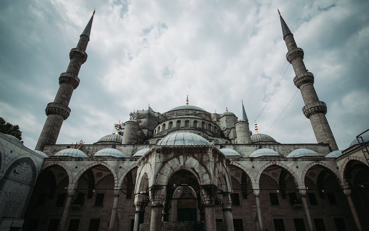 a large building with two towers