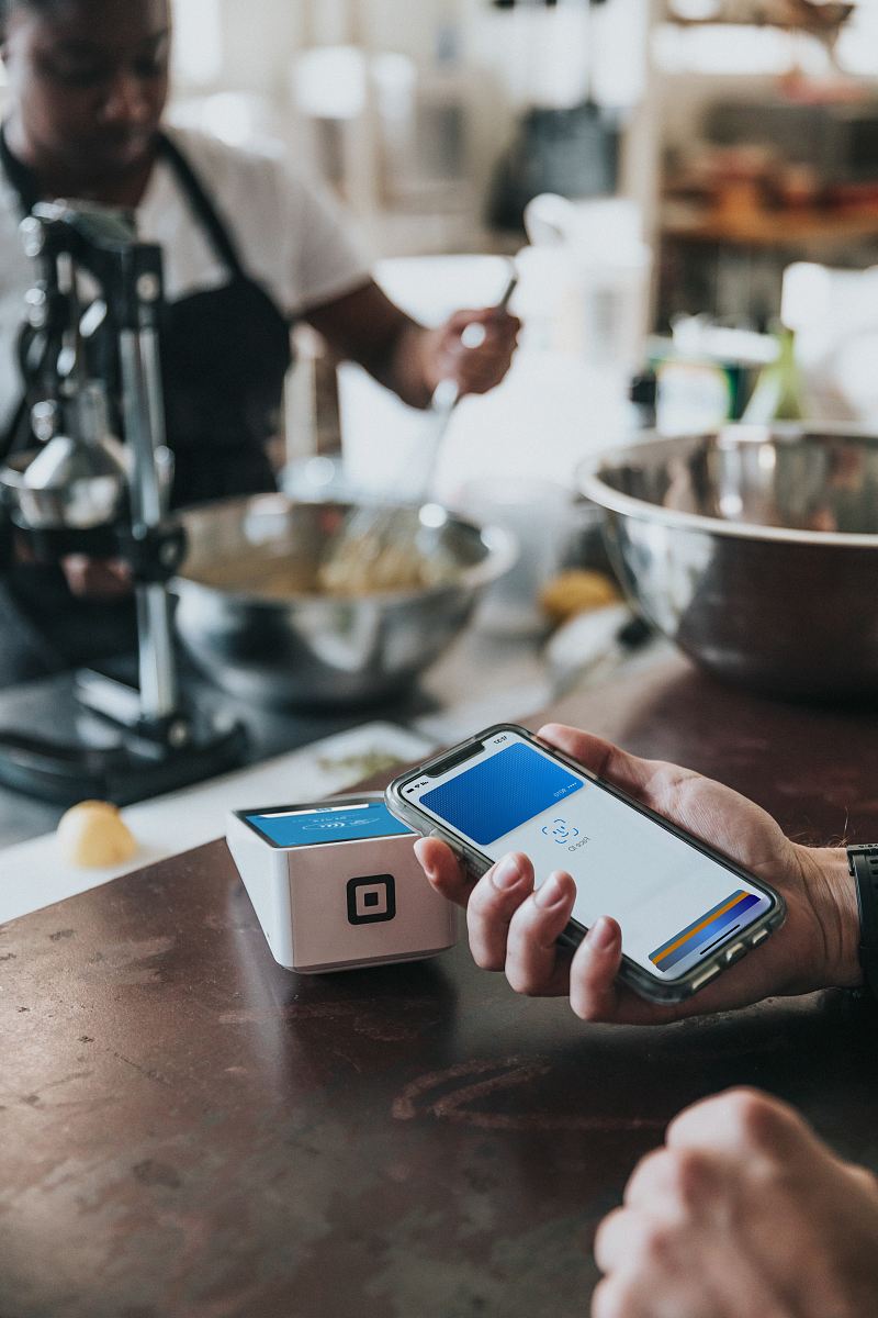 Man Engaged With Black Android Smartphone At A Cozy Table Image | Free ...