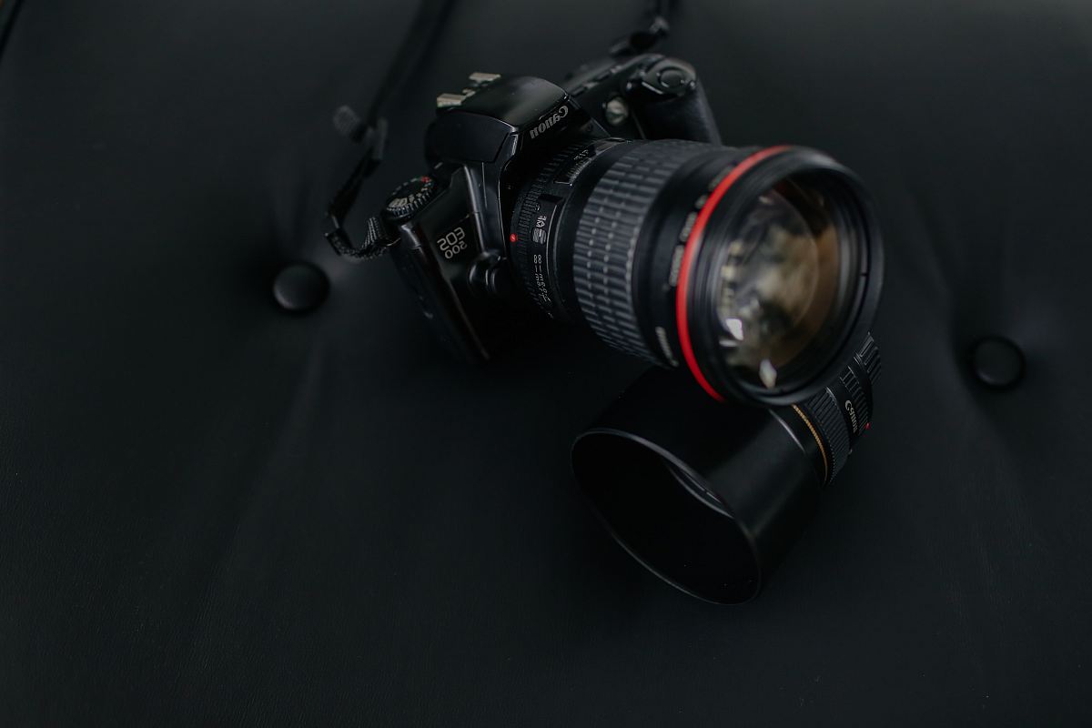 black Canon EOS DSLR camera