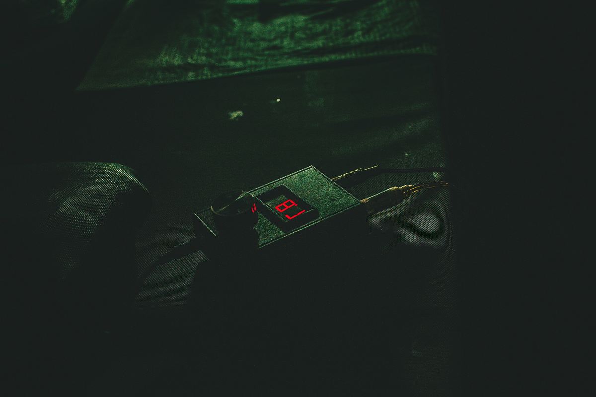 black digital device with the number 87