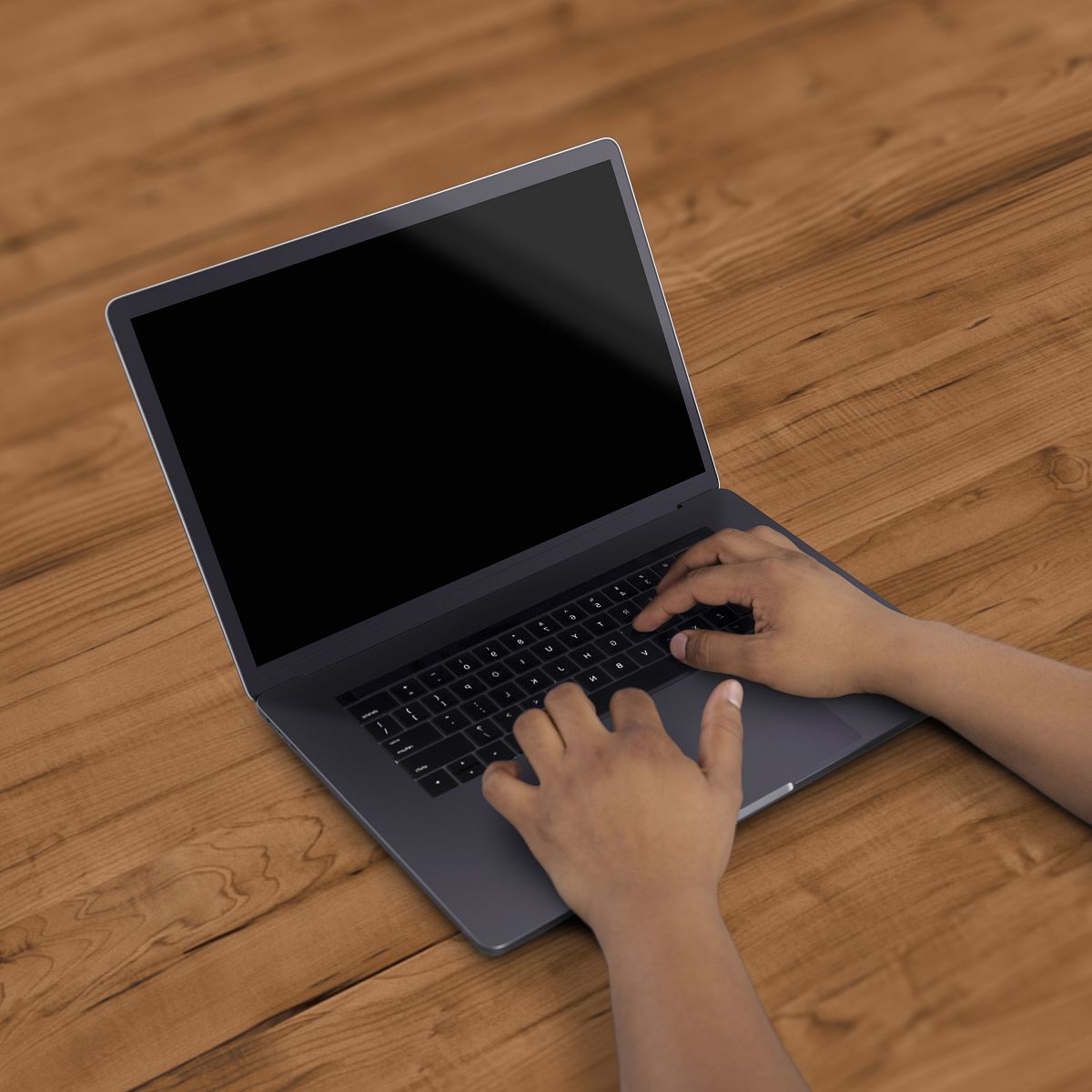black laptop computer on brown surface