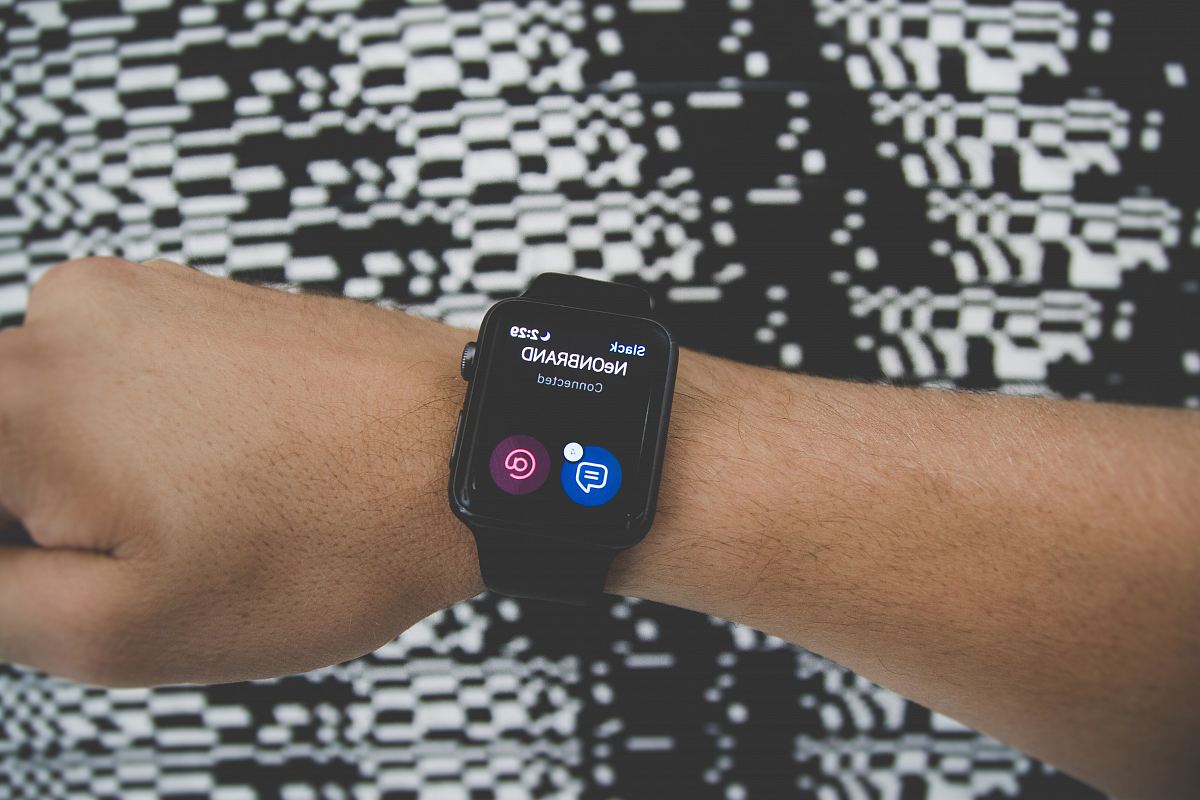 men with black smartwatch