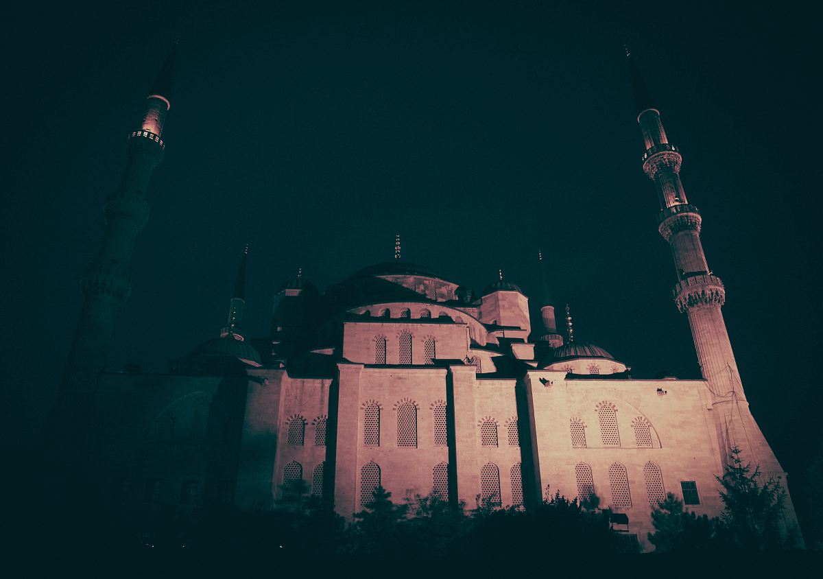 concrete mosque at night
