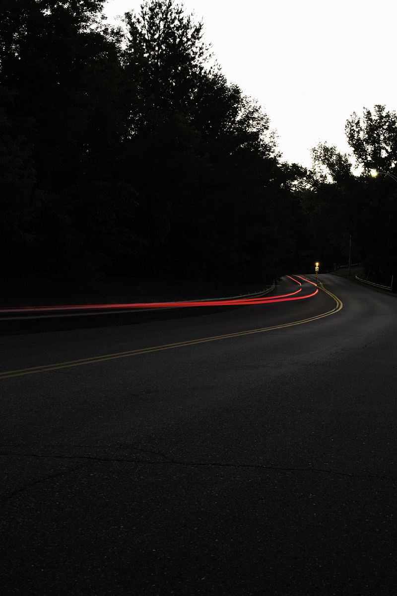 concrete road with cars passing