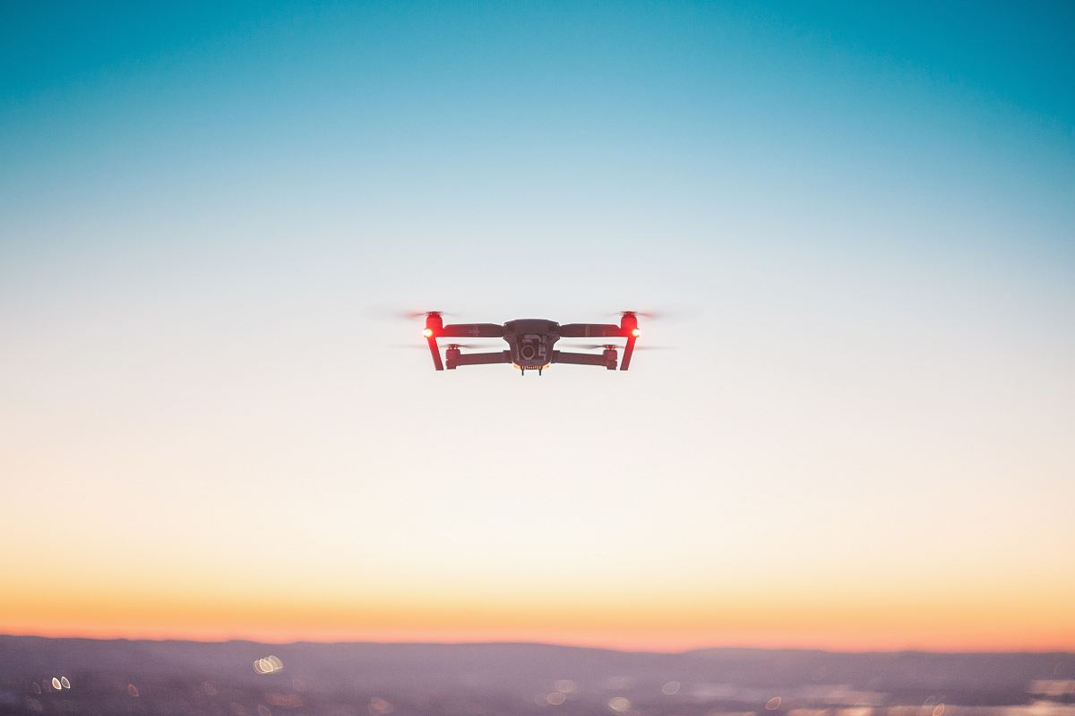 drone hoovering at daytime