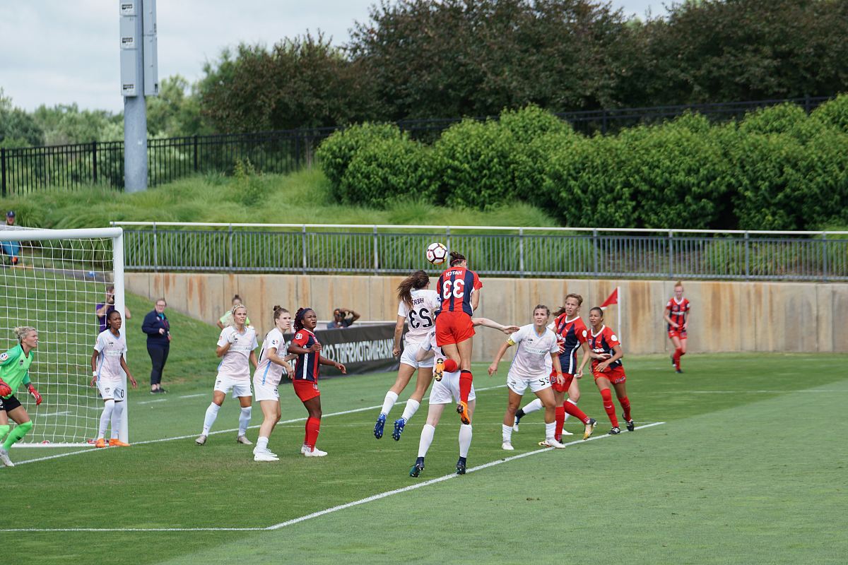 girls soccer team playing