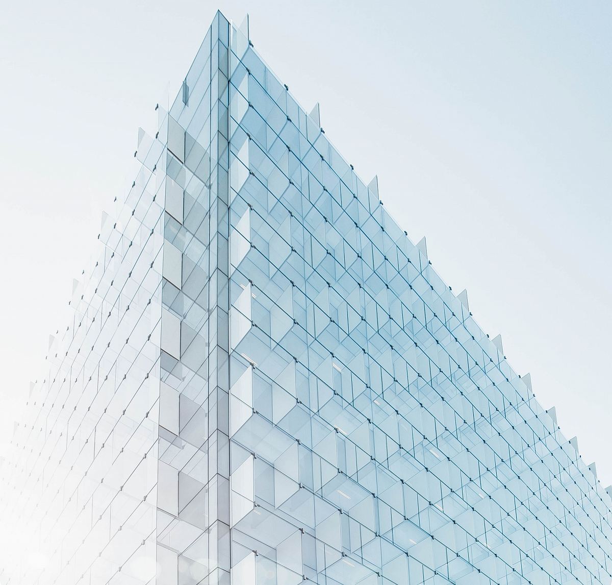 glass building under clear blue sky