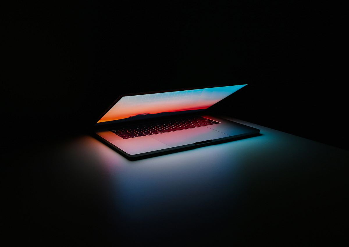gray and black laptop computer on surface
