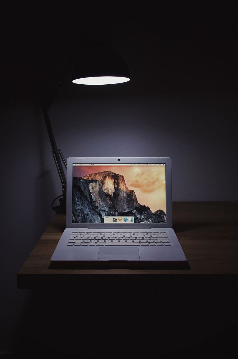 MacBook Air on wooden surface