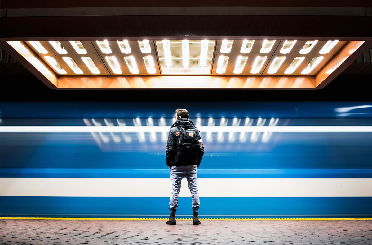 man in black backpack