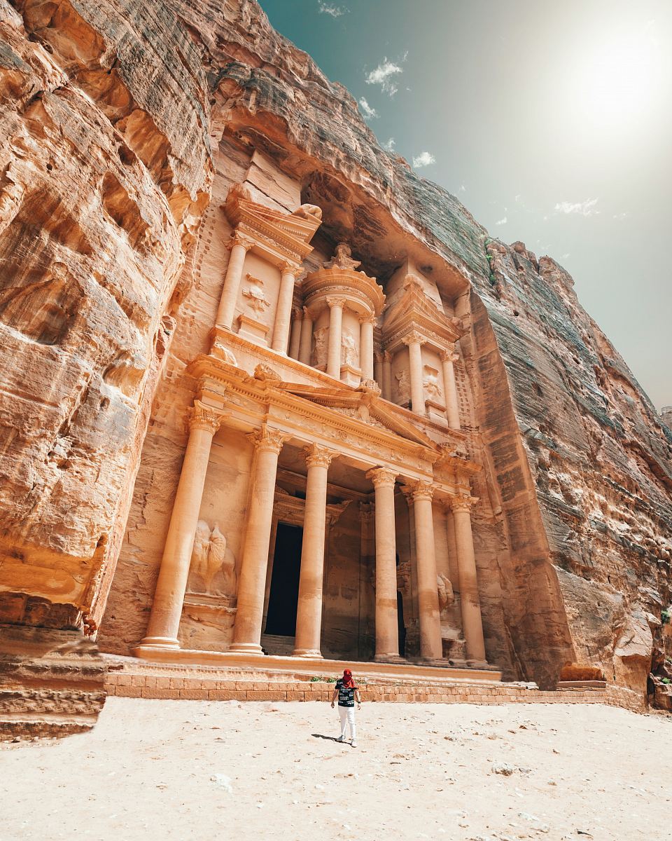 man standing near building