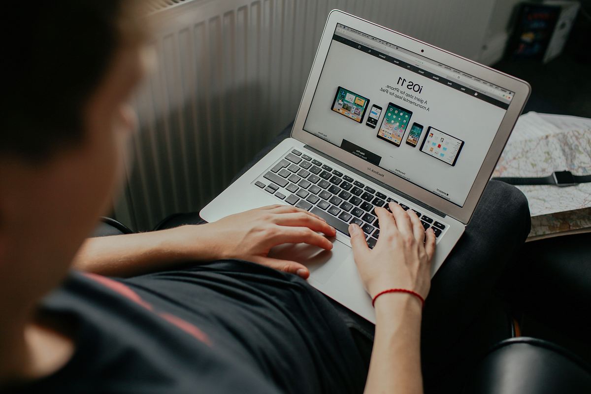 man using MacBook White