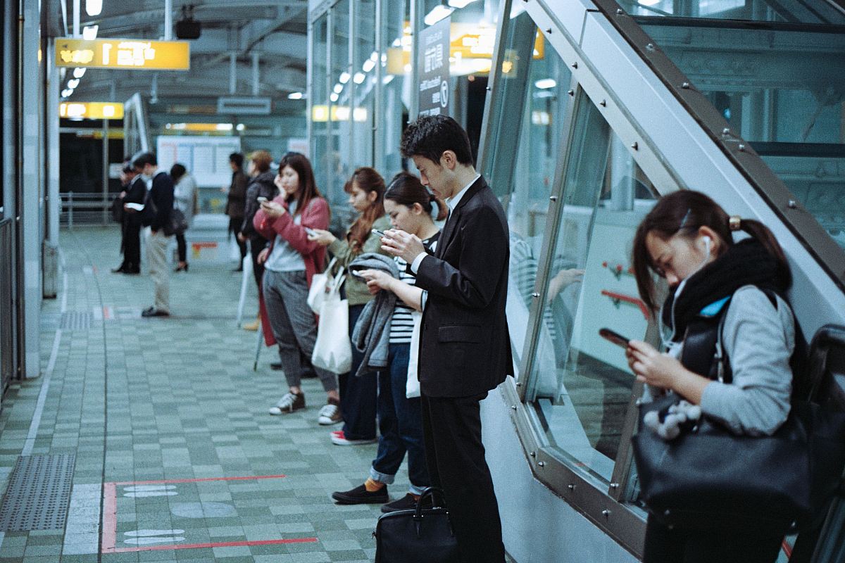 people standing inside train station
