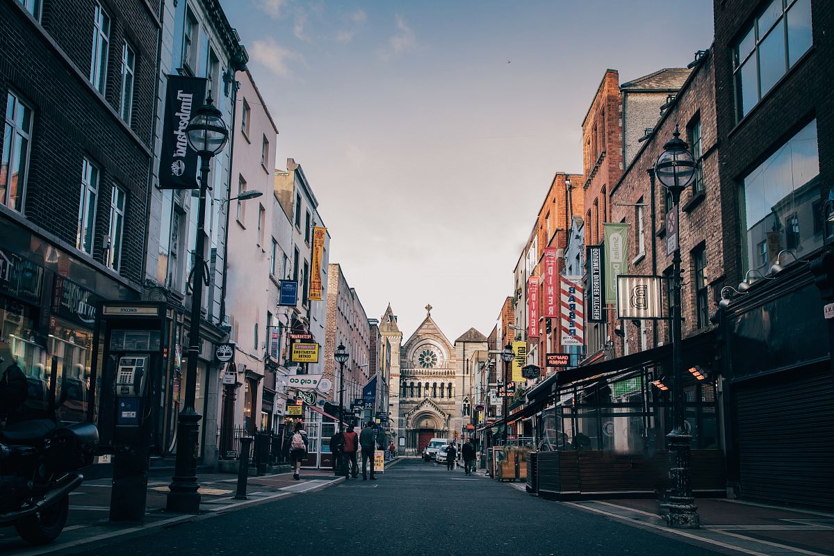 People Walking On Street Heading Towards Church Image Free Photo