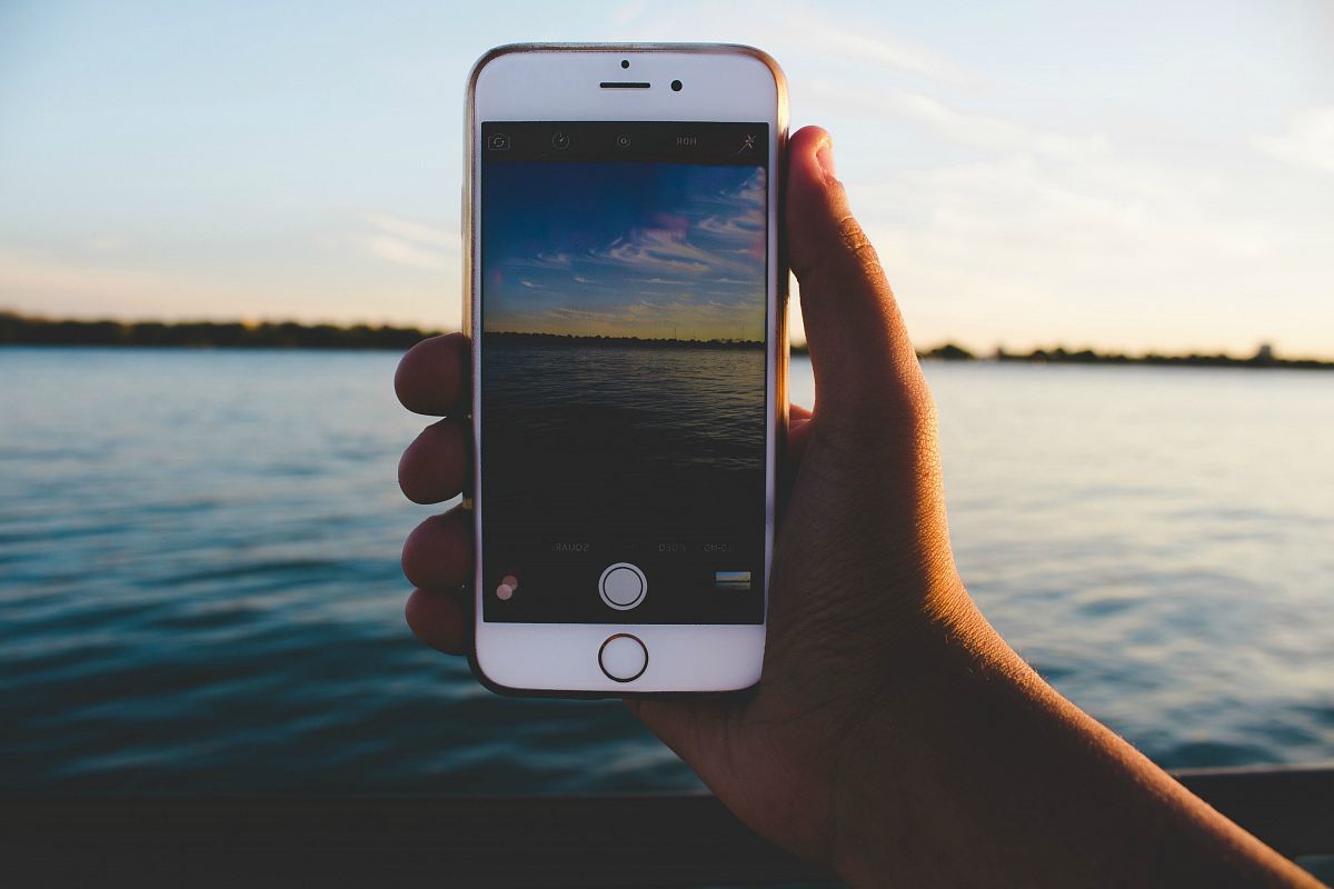 person holding iPhone