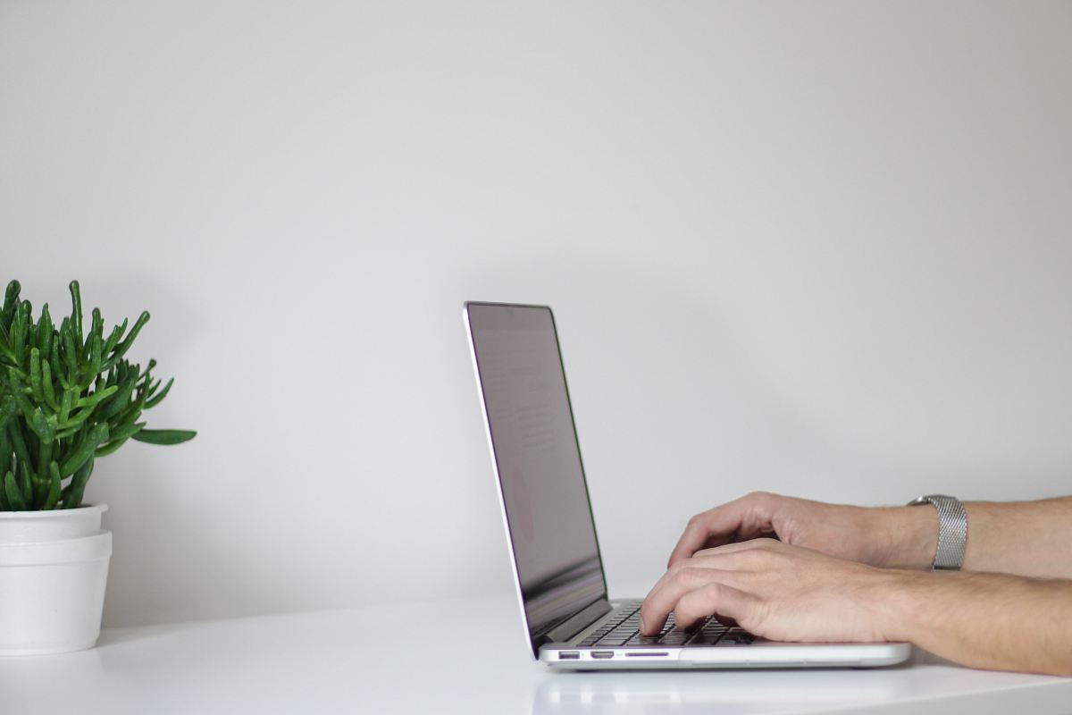 person using laptop
