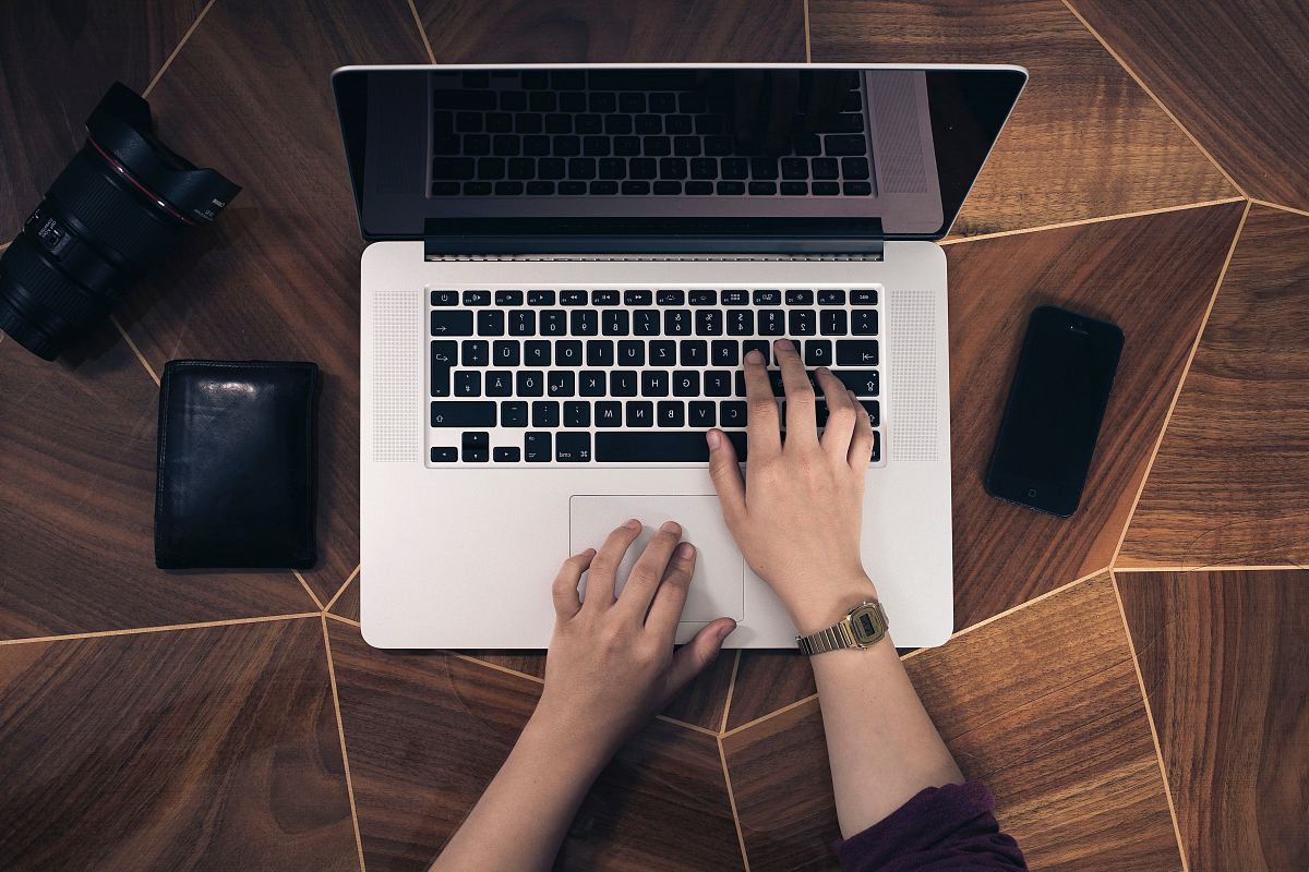 person using MacBook Pro