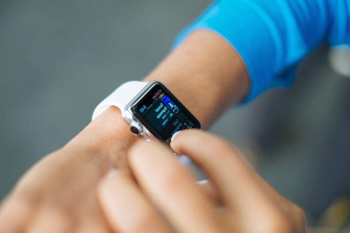 Person Wearing Silver Apple Watch With White Sport Band Image Free Photo