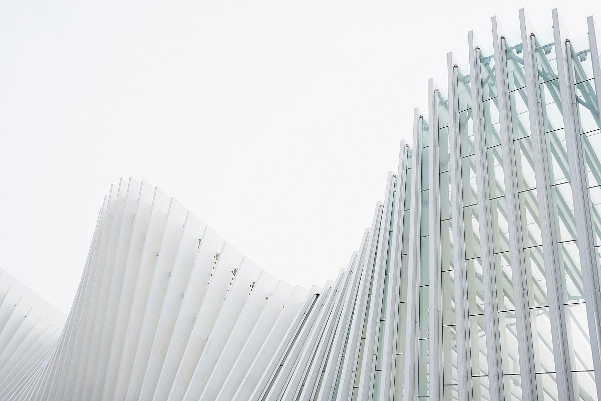 photo of white painted building at daytime
