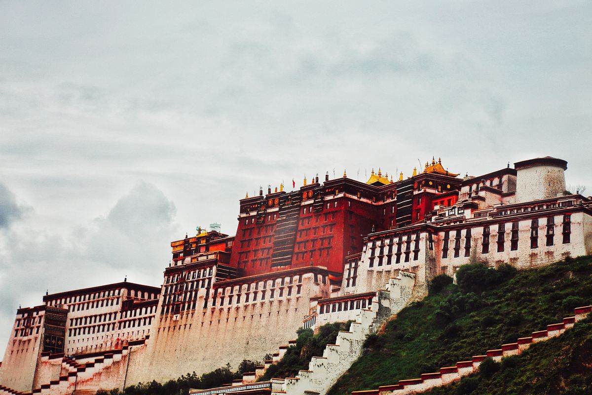 red concrete temple on the hill