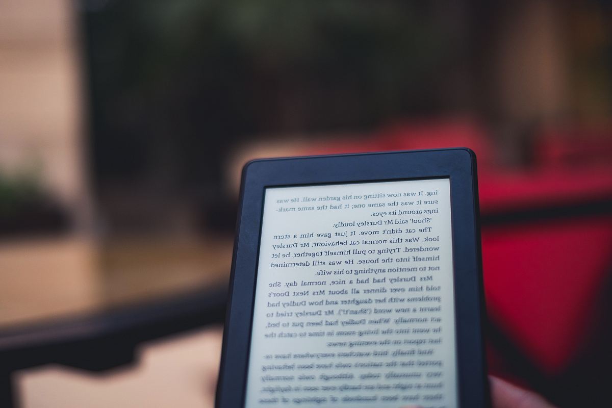 selective focus photo of turned on E-book reader