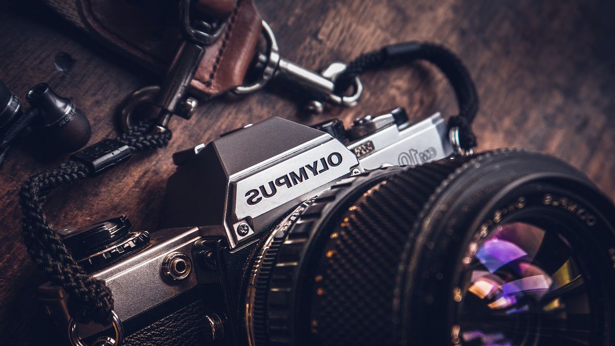 shallow focus photo of Olympus camera