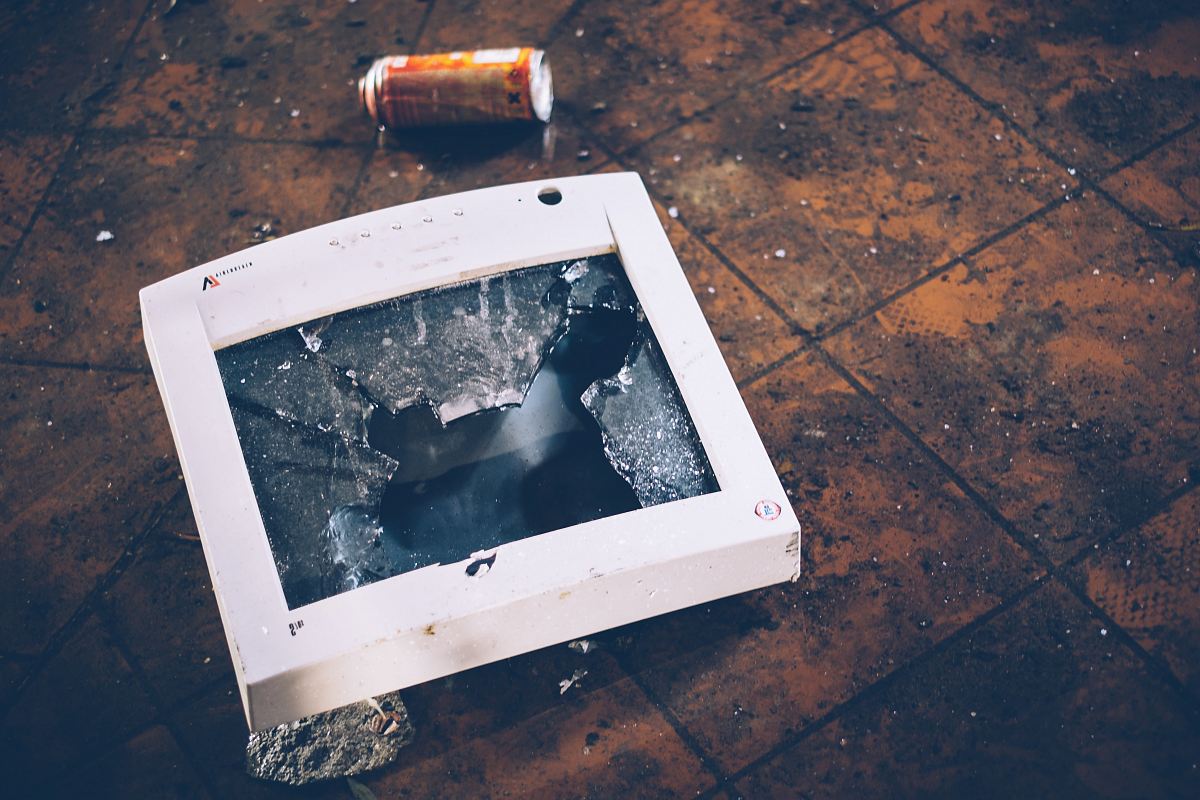 shattered monitor on the floor