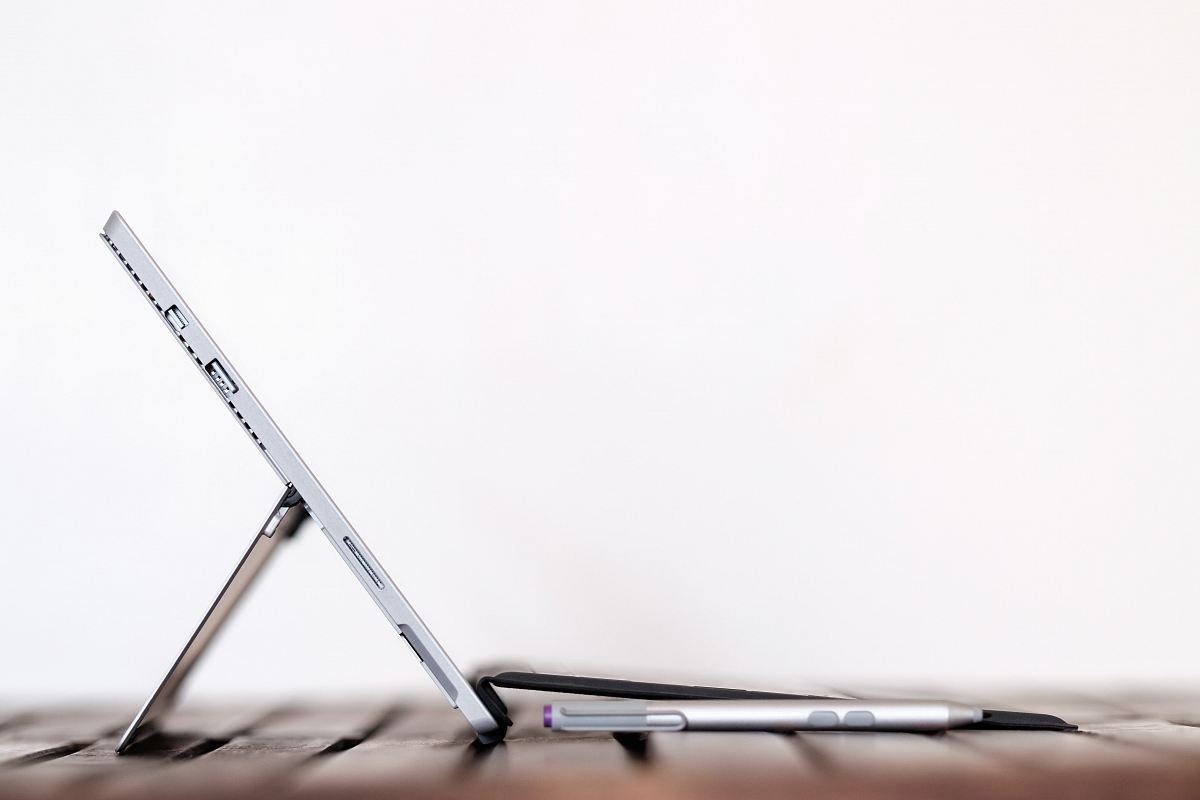 stylus pen in front of table computer