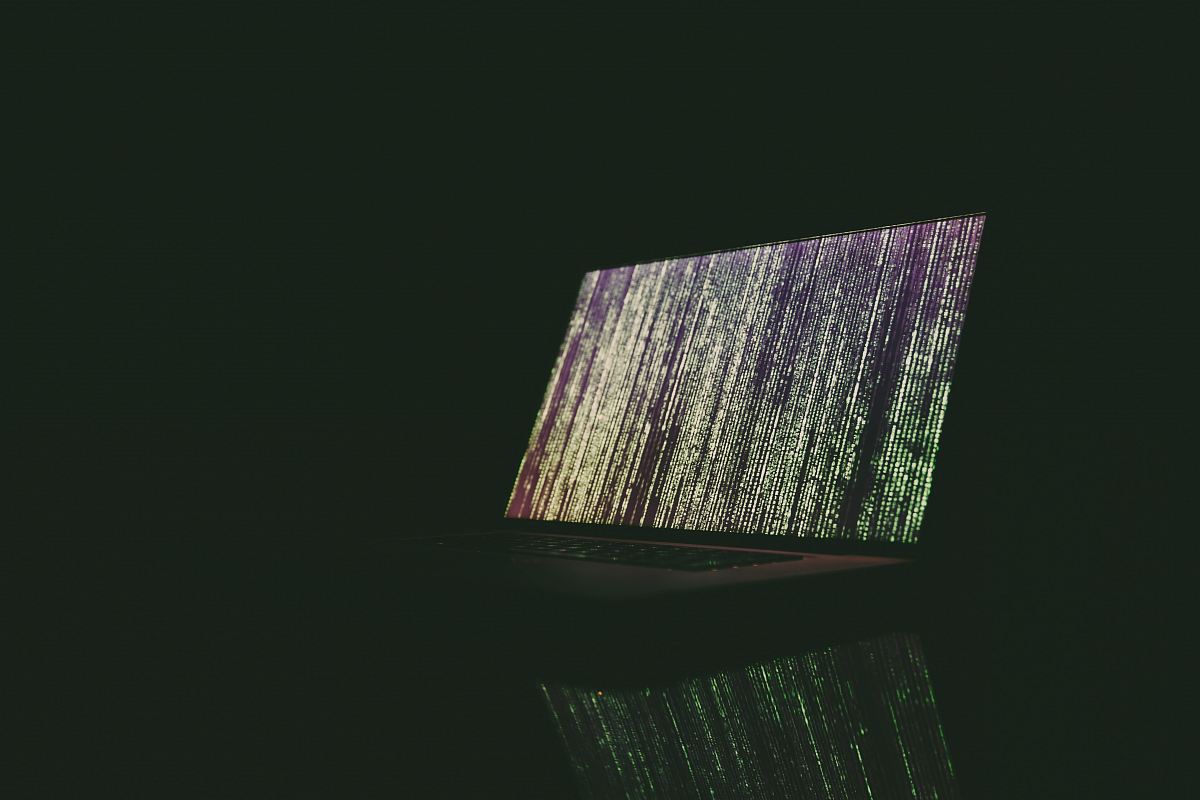turned on laptop on table
