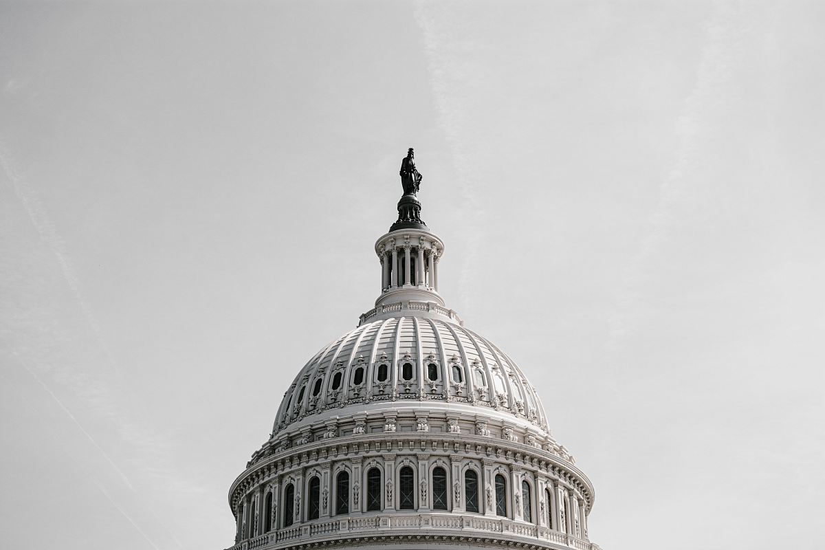 white building under cloudy sky
