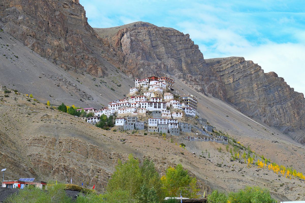 white painted building on high ground