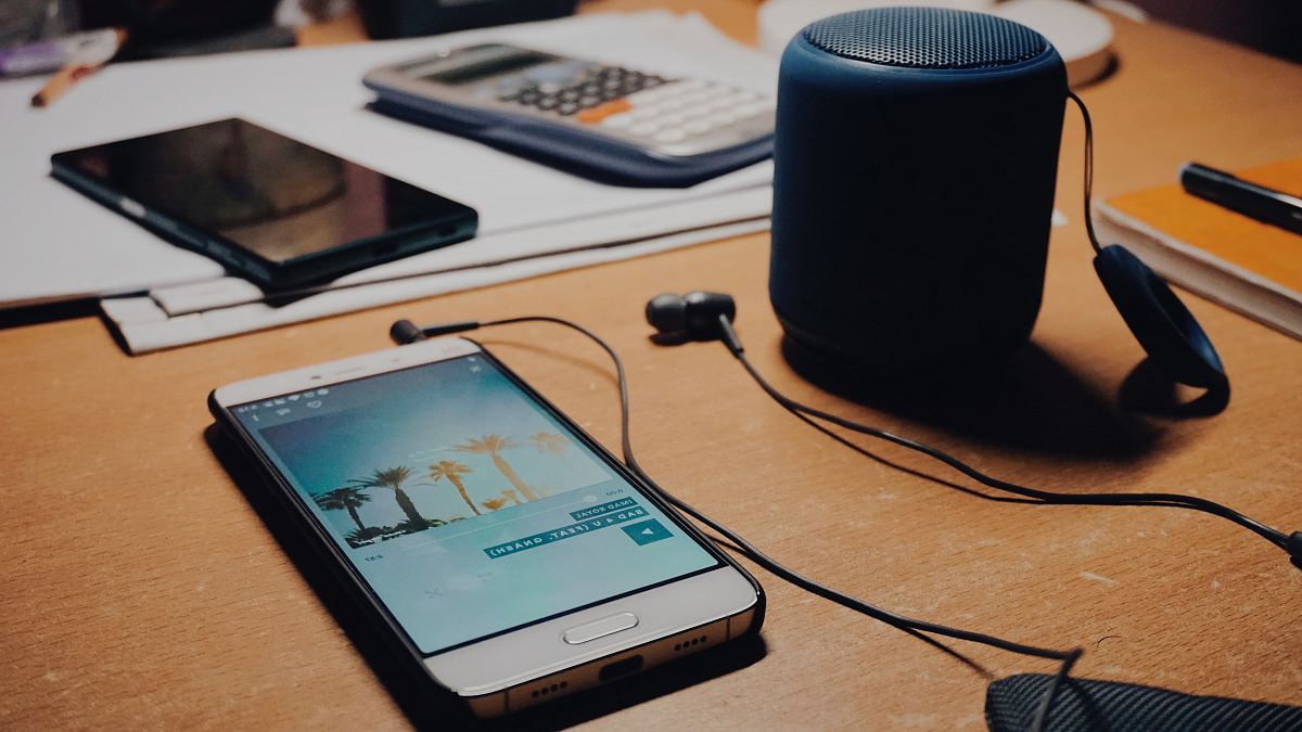 white smartphone with speaker