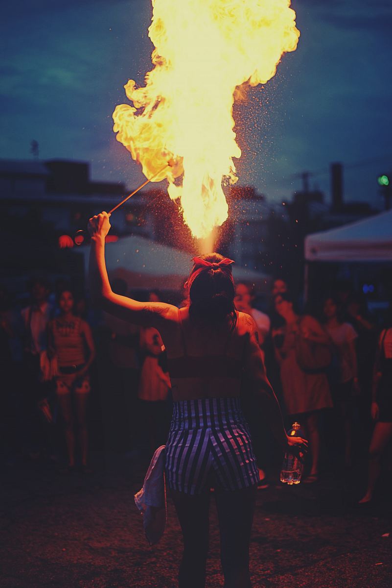 woman performing fire spitting