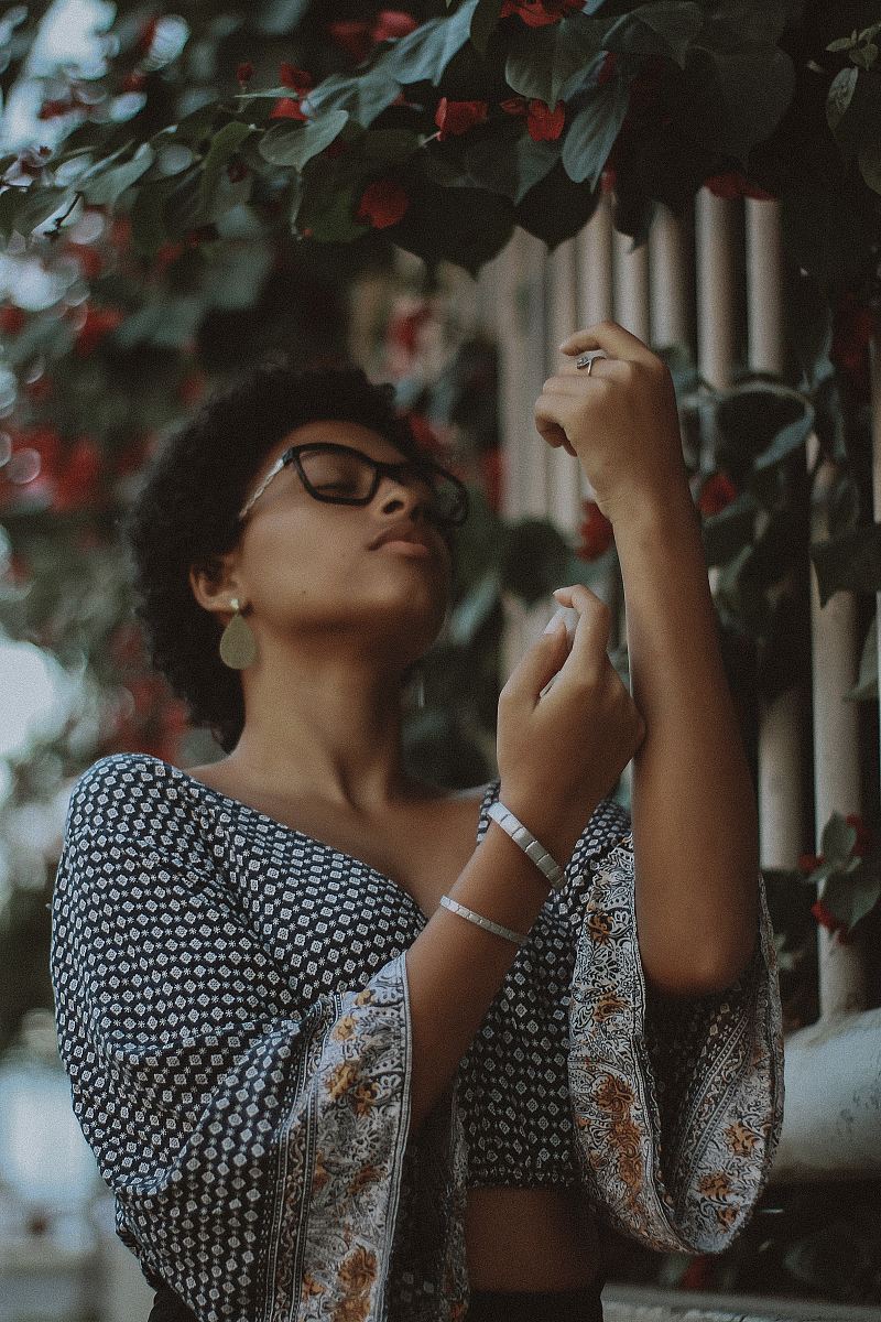 woman wearing eyeglasses and flare sleeve crop top