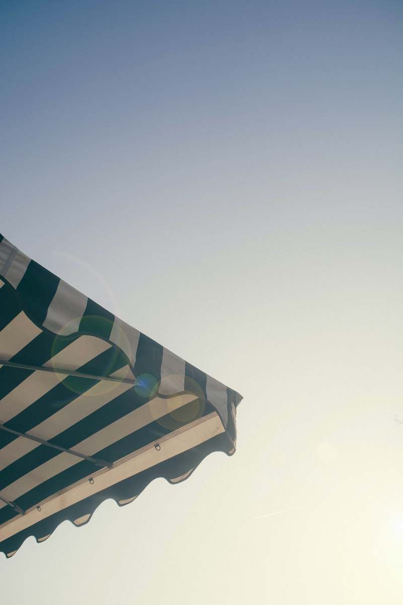  white and green striped umbrella 