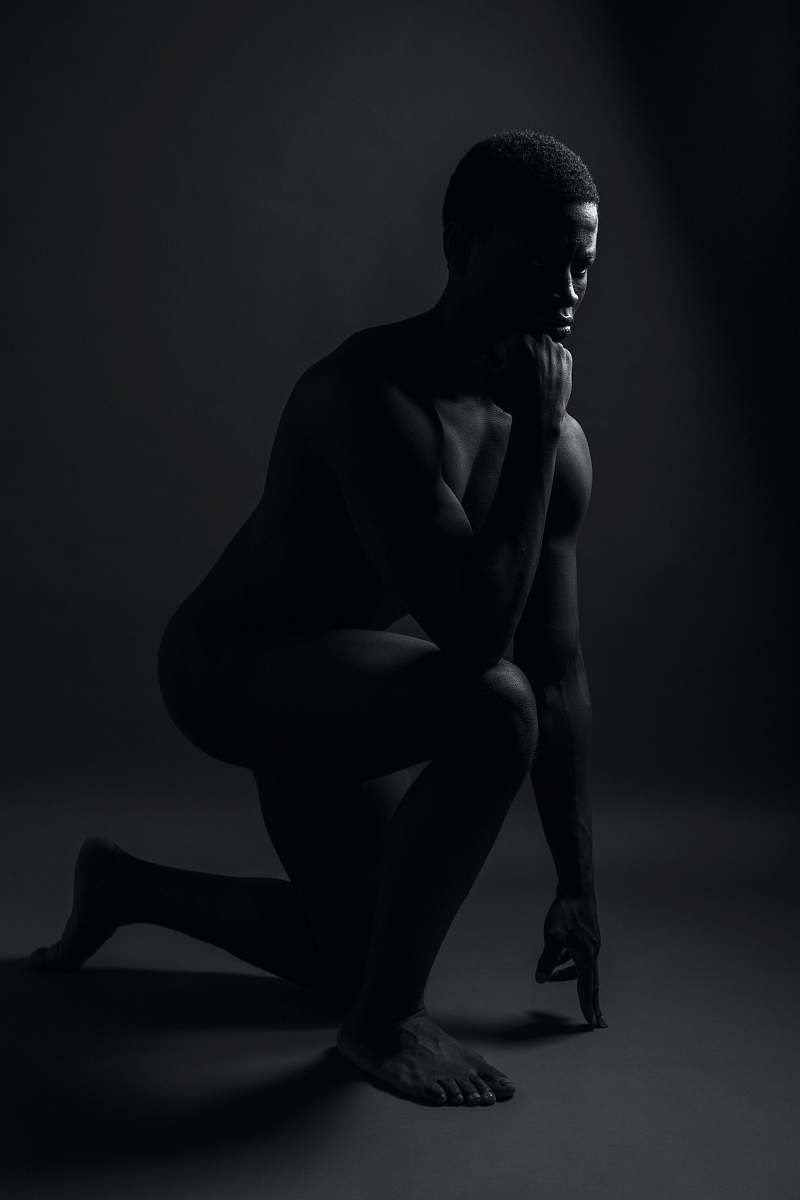 human black concrete statue of a woman black