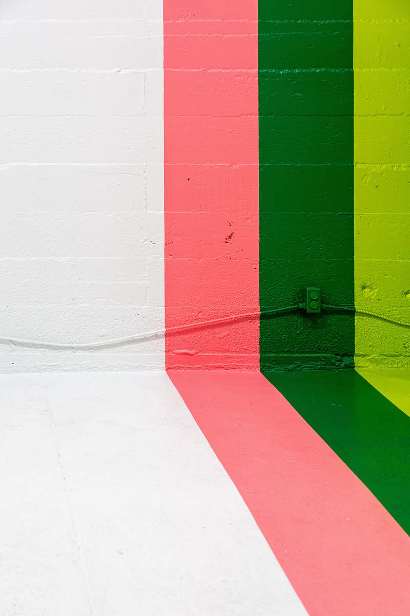 color white, pink, green, and yellow painted wall wall