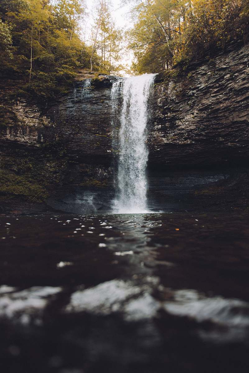 waterfall waterfalls surrounded with trees river