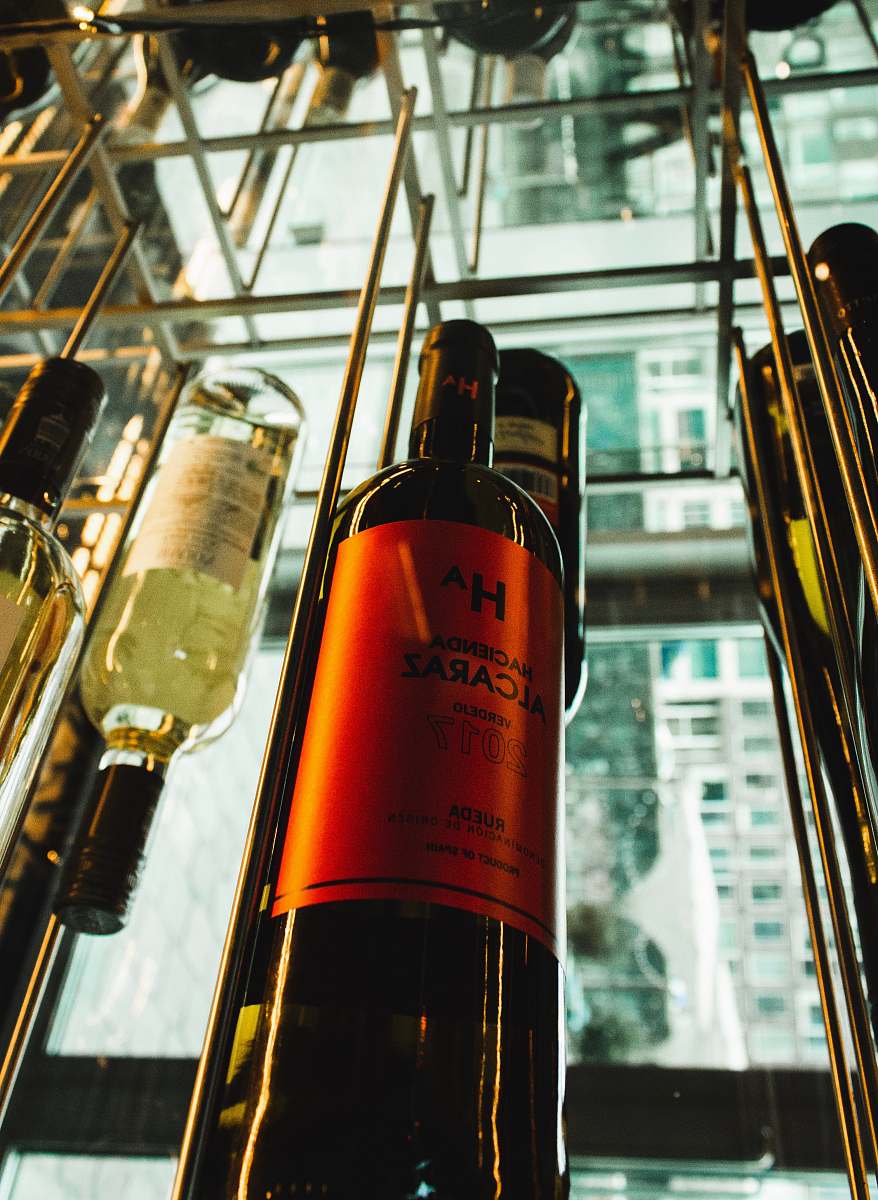 alcohol orange labeled wine bottle drink