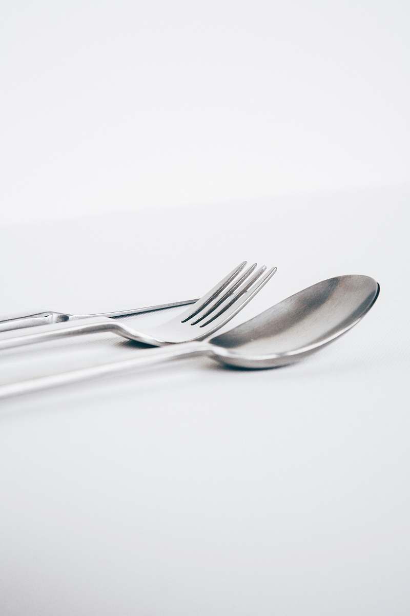 grey spoon and fork fork