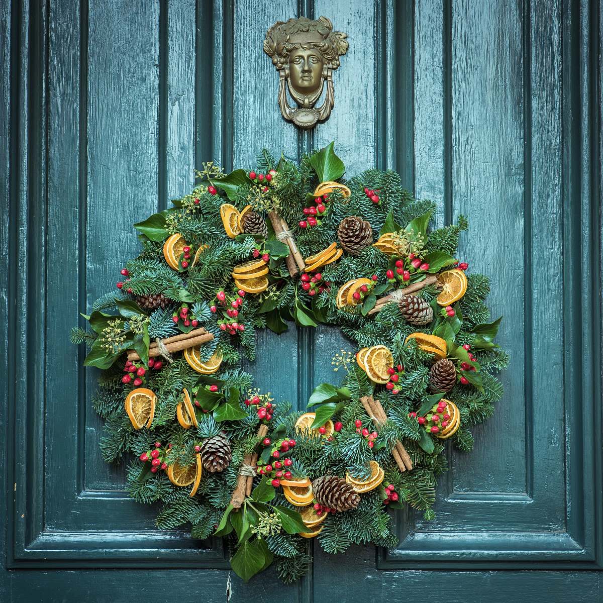 Wreath Photo Of Green Door Wreath Mounted In Green Wooden Door Pottery ...