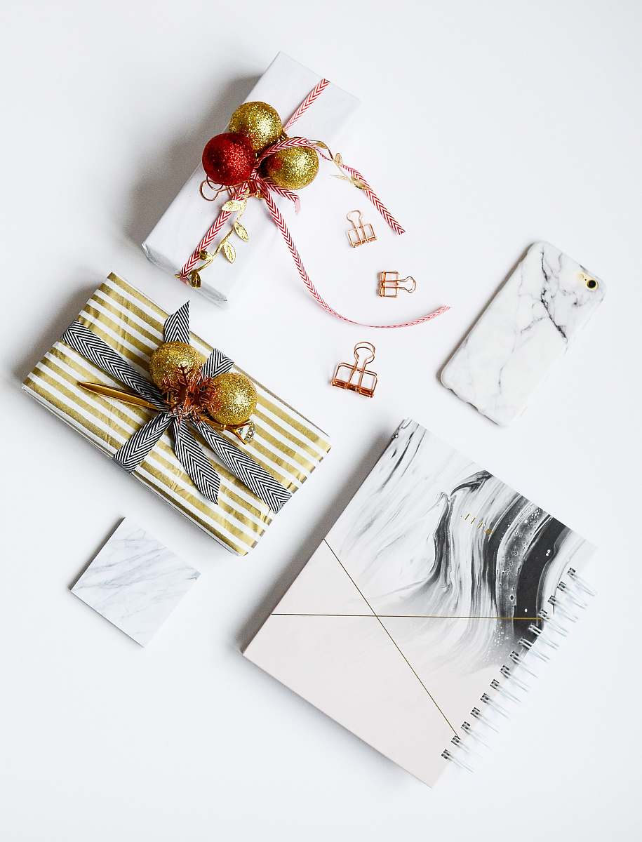 holiday several assorted-color present boxes and notebook on table gift