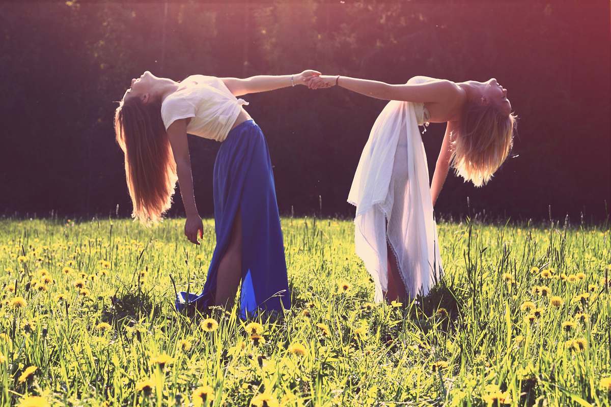 Woman Two Women Bending While Holding Hands Girl Image Free Photo