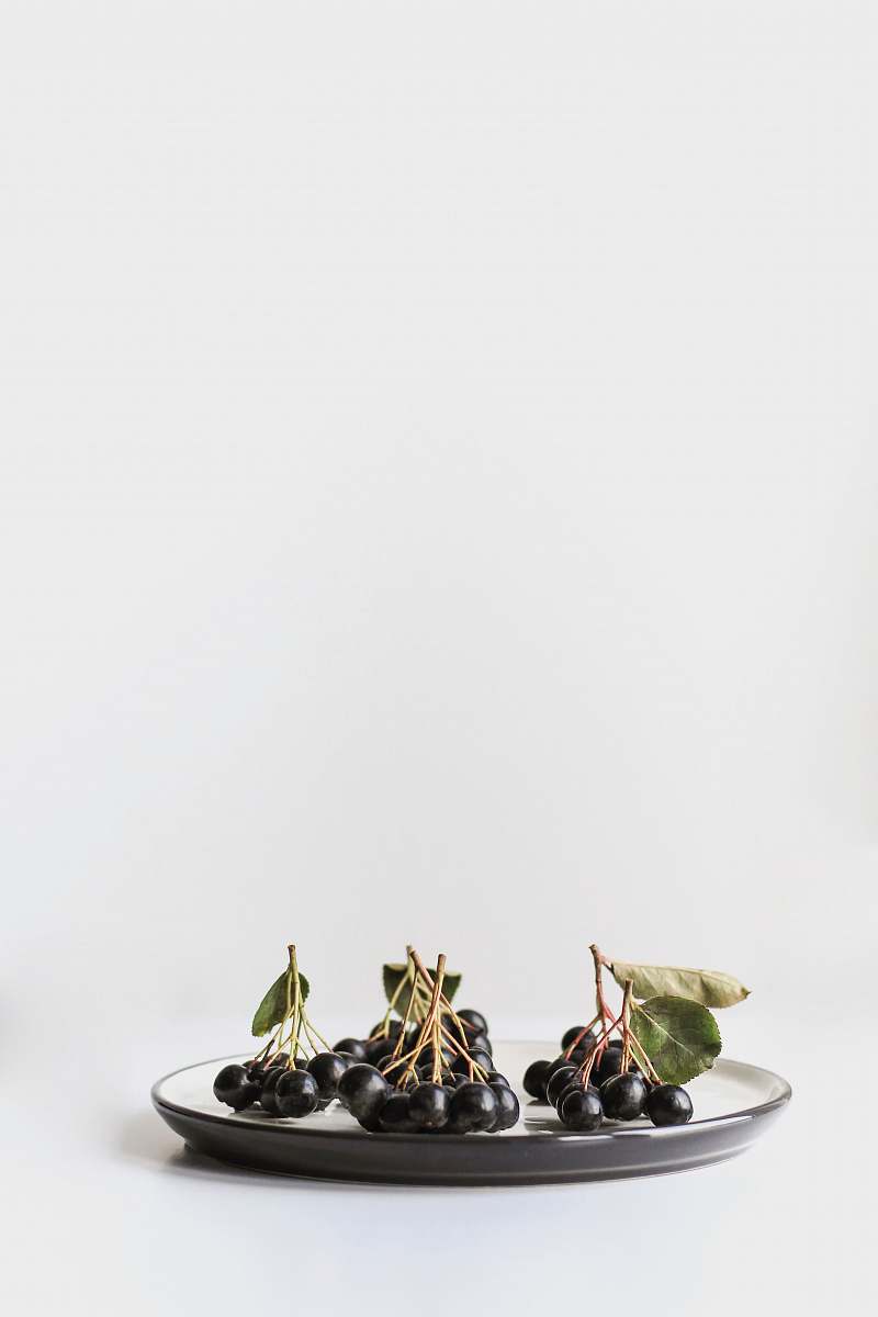 fruit bunch of grapes on ceramic plate dish