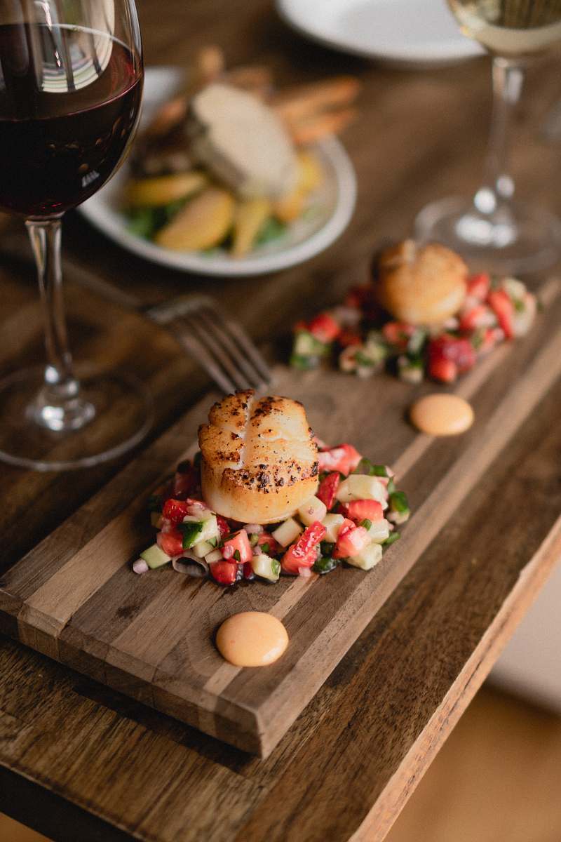 fondue shallow focus photography of meat with vegetables wine