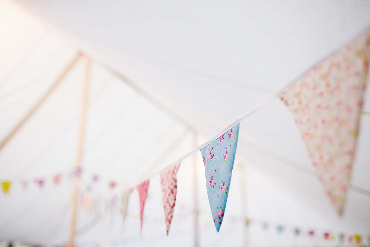 flag closeup photo of blue and white buntings cloth