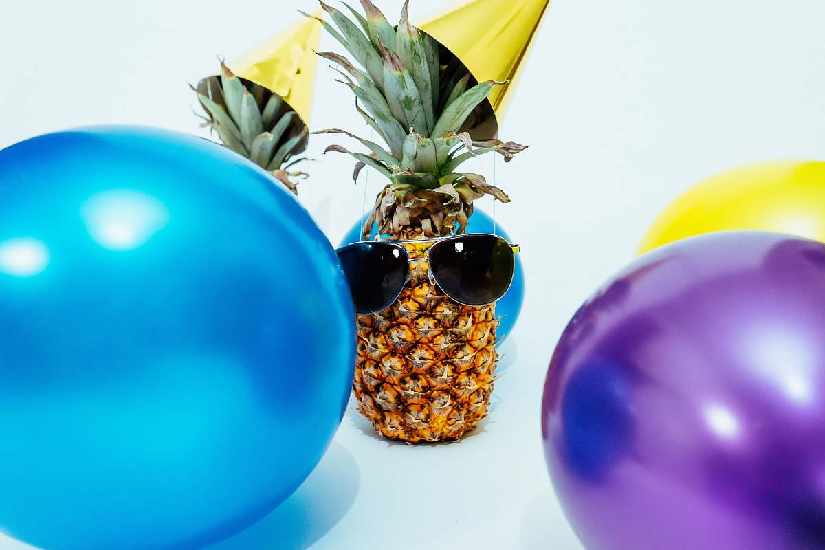 fruit photo of pineapple fruit with sunglasses party