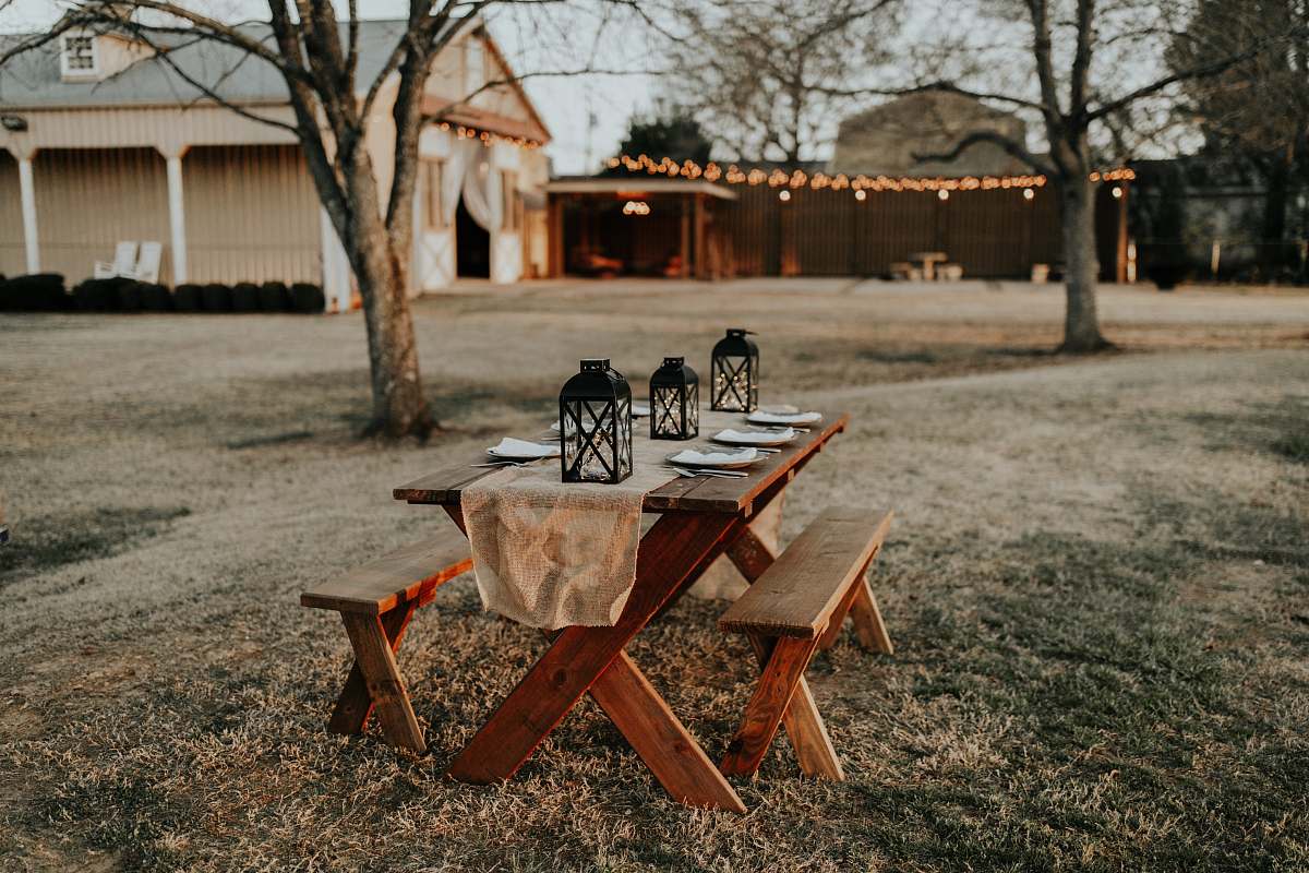 chair rectangular brown wooden picnic table on the field furniture